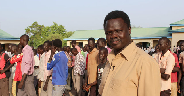 Valentino is laying on the floor while being robbed