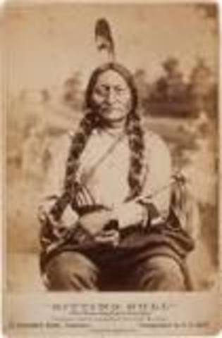Sitting Bull performs in a wild west show