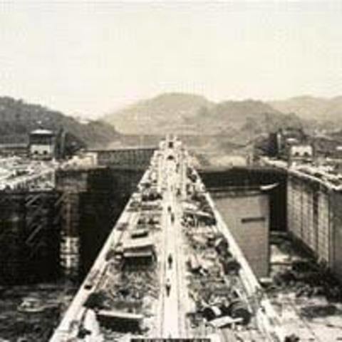 The Panama Canal is completed and opened for traffic
