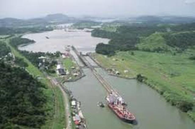 The Panama Canal is completed and opened for traffic