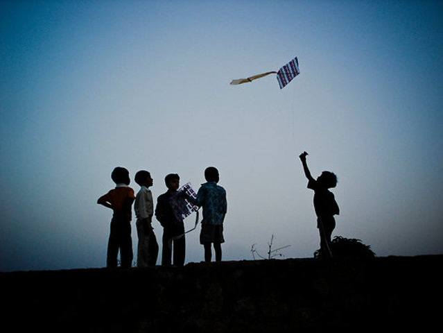 Amir flies a kite with Sohrab