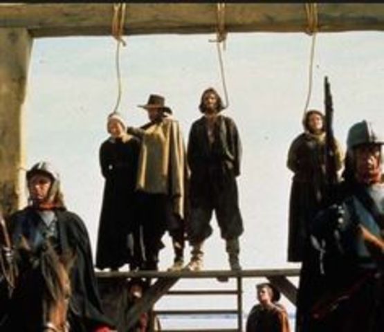 John and Rebecca Nurse are led to the gallows to be executed.