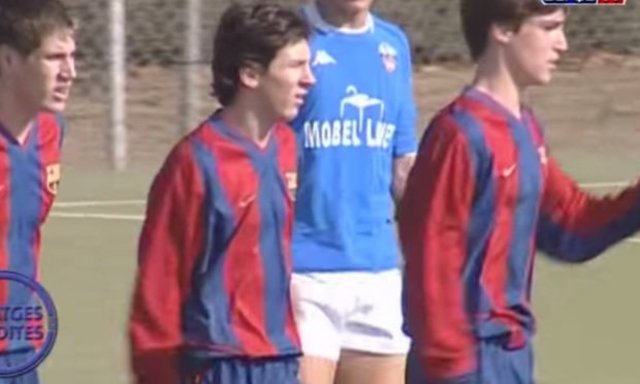Messi signs with FC Barcelona's youth team