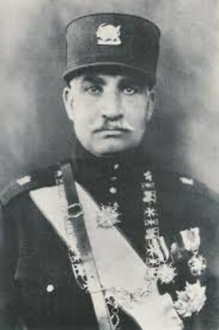 Military commander Reza Khan seizes power.