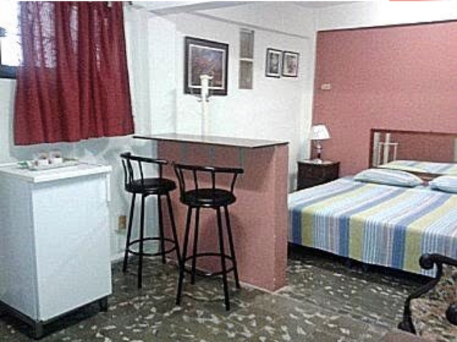 En su niñez vivienda en un pequeño apartamento de un solo dormitorio.