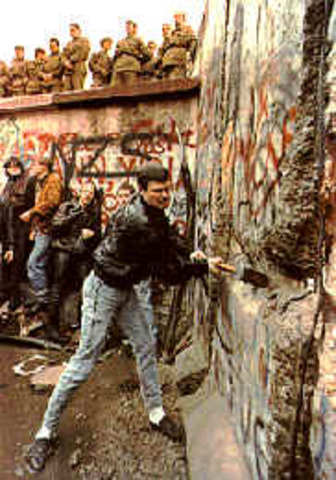 Official destruction of the Berlin Wall began
