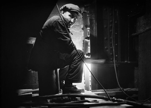 A Worker on the Brooklyn Bridge