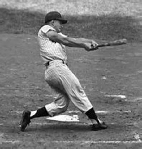 Roger Maris of the Yankees breaks Babe Ruth's single season home run record