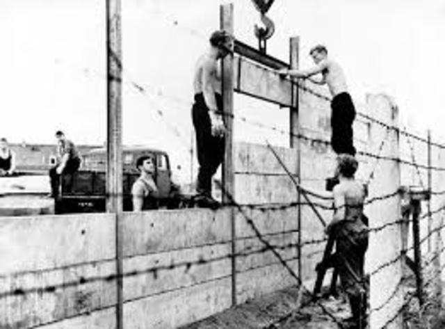 Building of the Berlin Wall Begins