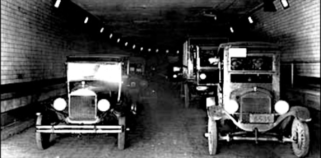 The holland tunnel connecting NYC and NJ opens.