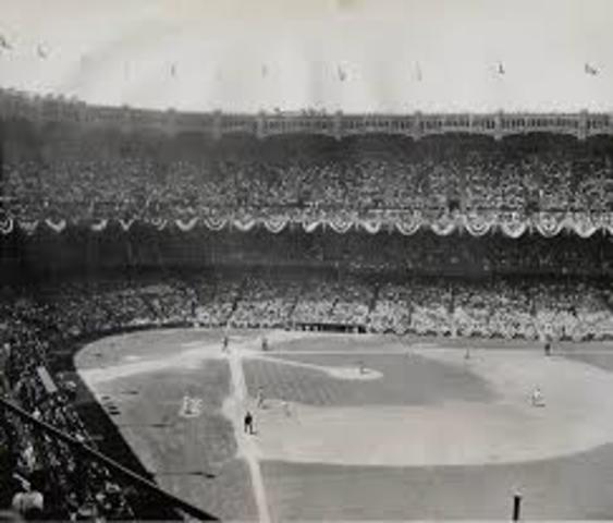 First game in the newly built Yankees stadium is played.
