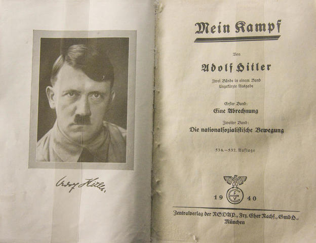 Adolf Hitler publishes Mein Kampf