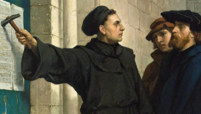 Martin Luther henger opp de 95 tesene