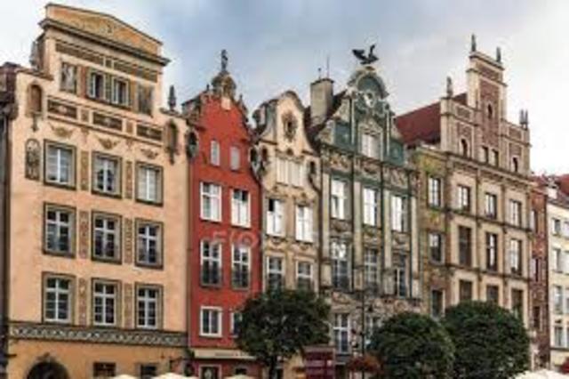 Katherine lived in Poland for all of her younger life (till she was 16). Her family owned an apartment building complex which left her and her family fairly well off.