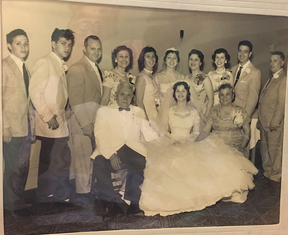My great grandparents celebrating my grandparents' wedding and their other 10 chilldren