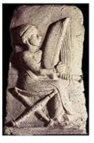 Placa con un tañedor de arpa. Babilonia. Periodo Isin-Larsa. (2.000 a.C.)