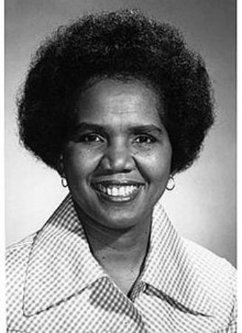 Première femme noire élue députée au Canada.