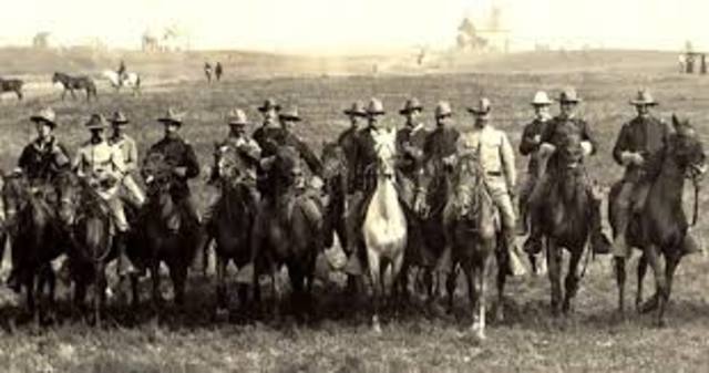 New Mexicans prove their loyalty to the U.S by serving heroically in the Spanish-American War, especially as members of a cavalry unit known as the rough riders
