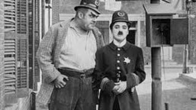Police (1916) Charlie Chaplin