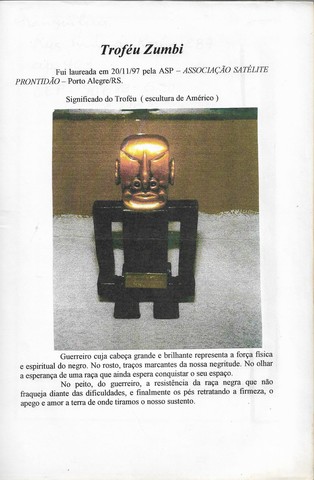 LAUREADA COM TROFÉU ZUMBI