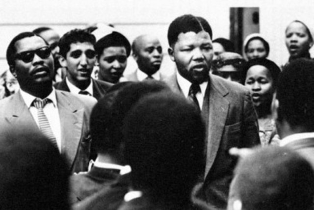 Mandela charged with treason