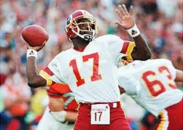 Doug Williams wins Super Bowl XXII as a Redskin Quarterback.