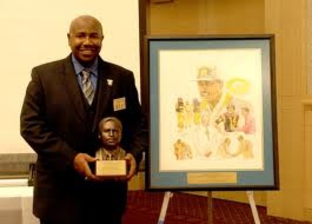 Eddie received Amos Alonzo Stagg Award
