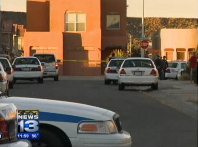 Suspect approaches officer with assault rifle