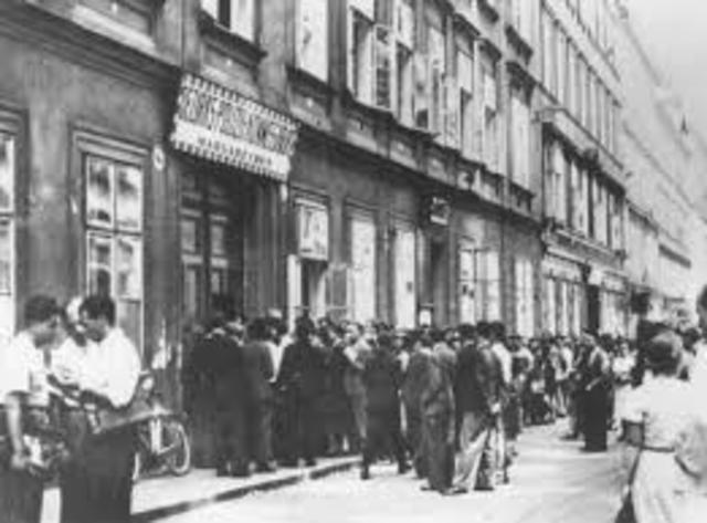 Jewish Refugees wait for exit Visas at a Police Station
