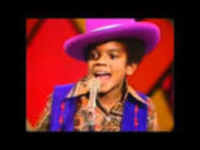 He began his career as singer with his band