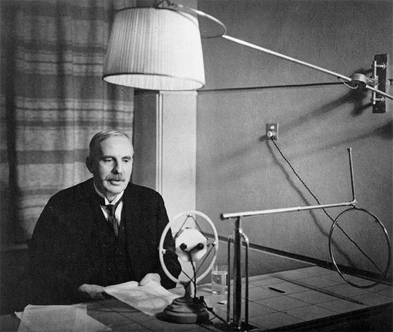 Ernest Rutherford discovers the proton