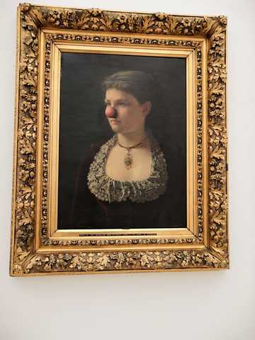 Man and Woman with Red Nose