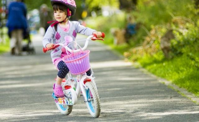 Child Learns to Ride Two-Wheeled Bike!