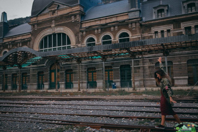 He looks a girl selling baskets, her clothes are old. he buys her a basket, they speak and he goes on the journey.