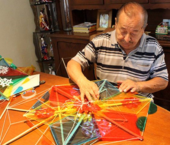 Ahmed starts making a kite for peace