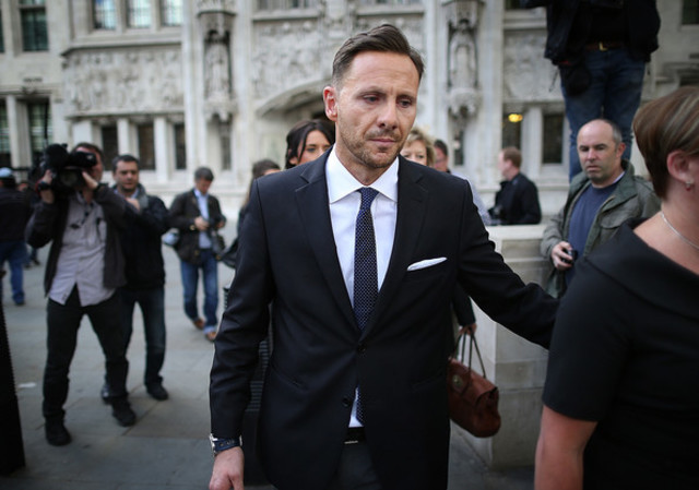 The News of the World's royal affairs editor Clive Goodman is jailed for four months.