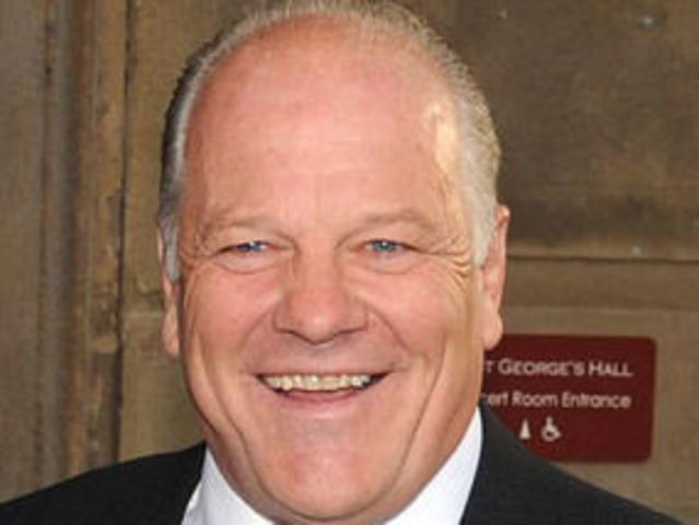 Football pundit Andy Gray accepts £20,000 in compensation from the News of the World owner News Group Newspapers, plus undisclosed costs, over voicemail interceptions.