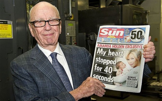 Rupert Murdoch uses adverts in national newspapers to apologise for the News of the World's "serious wrongdoing".