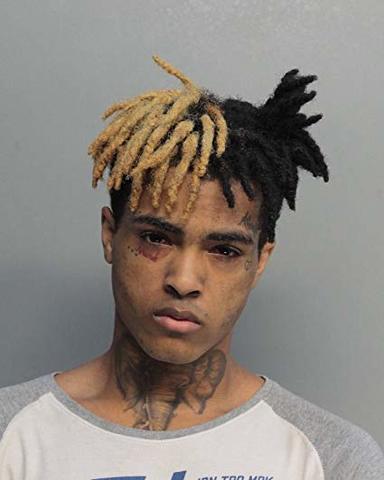 Jahseh's then-girlfriend of Jahseh files reports that he abused her