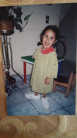 Wearing dad's clothes