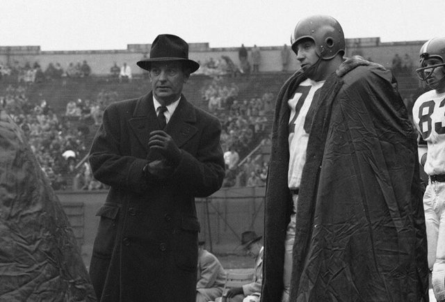 Cleveland browns coach invented the single-bar face mid game