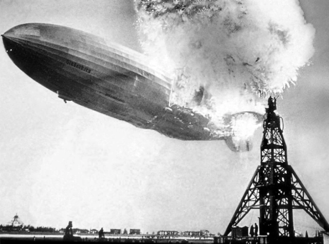 The airship Hindenburg catches fire and burns