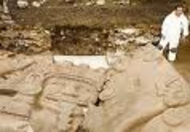 Two massive Aztec sculptures are dug up in Mexico City.