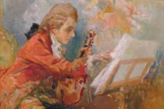 5 years old.  He could play the .................... and the ................. and composed music as well.