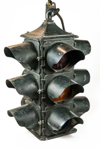 First electric traffic light invented.