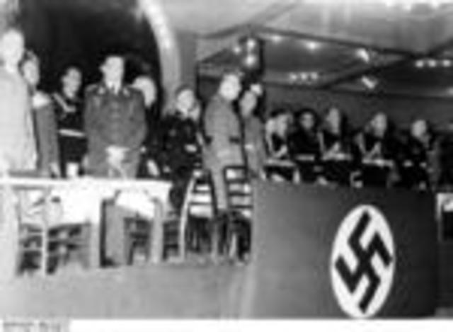 Hitler begins military buildup