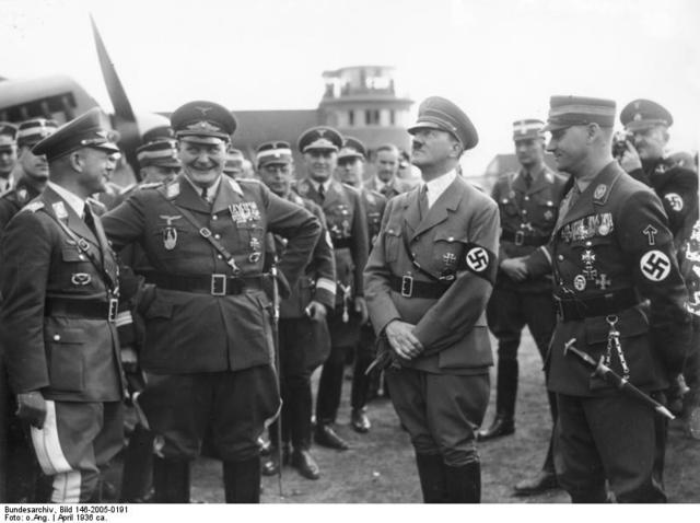 Hitler begins military buildup