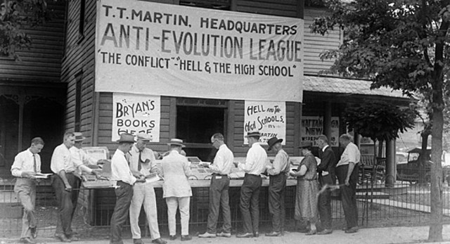 John Scopes arrested for teaching evolution in school