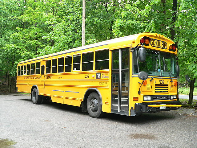 Heidi gets on a bus to go to New York.