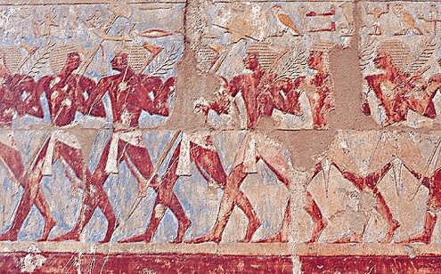 Murales en Egipto que ilustraban luchadores en diferentes posiciones